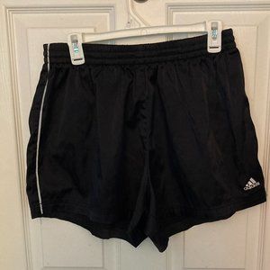 Loose black adidas shorts with a satin feel and elastic band size XL